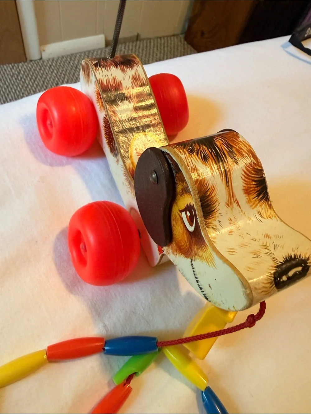 Vintage Wooden Pull-Along Dog Toy in Brown with Red Wheels 1968